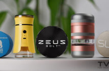 Reihe aus Metall Cannabis Grindern auf einem Tisch, mit Cali Crusher Homegrown, Zeus Bolt XL und SLX, plus zwei kompakte Grinder.