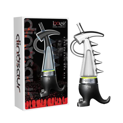 Lookah Dinosaur Dab Rig neben seiner Verpackung, mit einzigartigem Dinosaurier-Design, lila Basis in Form von Dinosaurierfüßen, transparentem Glasteil mit Stacheln und gebogenem Mundstück. 