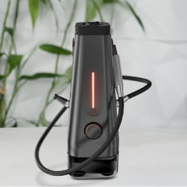 AirVape Enso Tisch-Vaporizer mit leuchtender orangefarbener LED-Leuchtung und angeschlossenem Schlauch.